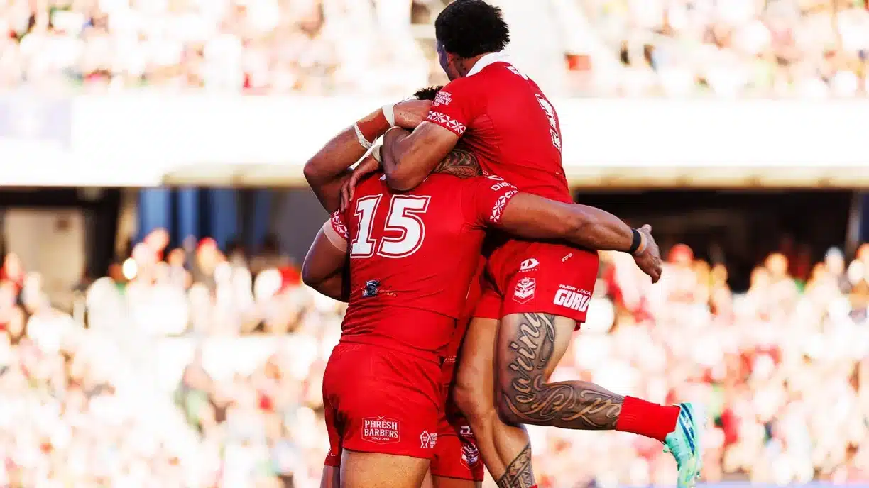 Tonga celebrate rugby league win over England at World Cup
